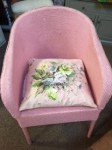 Pink chair and cushion